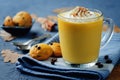 Pumpkin spice latte with whipped cream and pumpkin chocolate chi Royalty Free Stock Photo
