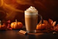 A pumpkin spice latte with whipped cream and a sprinkle of cinnamon. Ornamental pumpkins on wooden background Royalty Free Stock Photo