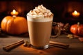 A pumpkin spice latte with whipped cream and a sprinkle of cinnamon. Ornamental pumpkins on wooden background Royalty Free Stock Photo