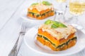 Two Slices of Pumpkin and Spinach Lasagne with Bechamel Sauce Royalty Free Stock Photo