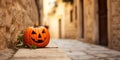 The pumpkin on the street of the ancient town is a symbol of Halloween, filling the air with a mysterious and enchanting