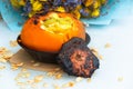 Pumpkin stuffed with chicken breast in cream sauce and bell pepper rounds Royalty Free Stock Photo