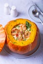 Pumpkin stuffed with shrimps and cheese, whole baked. Traditional Brazilian dish.