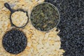 Pumpkin and sunflower seeds in bowl. Dried cereal seeds and fruits. Food ingredients, seed mix Royalty Free Stock Photo