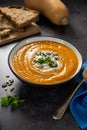 Pumpkin vegetable soup and sourdough bread. Top view. Royalty Free Stock Photo