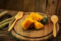 Pumpkin on wooden plate with spoon set, Clean food in dining room for health, Diet food for some people need to burn fat