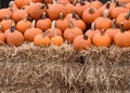 Pumpkins on a bale of hay Royalty Free Stock Photo