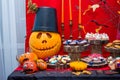 Pumpkins on the decorated table.