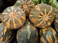 Pumpkins displayed on a supermarket shelf Royalty Free Stock Photo