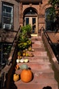 Pumpkins and Gourds Decorating an Outdoor Staircase to the Door of a Brooklyn Brownstone Home during Autumn Royalty Free Stock Photo