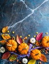 Halloween autumn flat lay background on dark marble surface copy space