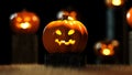 Pumpkins sitting on the stump at night