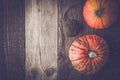 Pumpkins and turnip on the wooden table top view Royalty Free Stock Photo