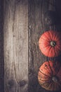 Pumpkins and turnip on the wooden table vertical Royalty Free Stock Photo