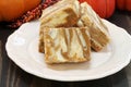 Pumpklin swirled pumpkin cheesecake bars Royalty Free Stock Photo