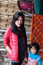 Punakha, Bhutan - September 11, 2016: Portrait of a Bhutanese woman and a sweet little girl