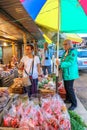 Punakha, Bhutan - September 10, 2016: Tourists shopping at local Bhutanese marketplace in Punakha, Bhutan.