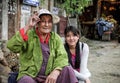 Punakha, Bhutan - September 10, 2016: Two local Bhutanese women sitting in street bazaar in Punakha, Bhutan.