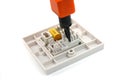 Punch-down tool on RJ45 wall socket