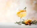 Punch drink. Alcoholic cocktail with rum ice and lemon slices on pastel light surface. White wine sangria. Fresh autumn beverage