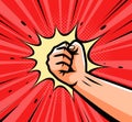 Punch, raised up clenched fist in retro pop art. Comic style vector illustration