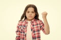 Punch you in your face. Stop bullying movement. Girl threatening with fist. Threatening physical attack. Kids aggression
