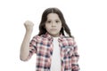 Punch you in your face. Stop bullying movement. Girl threatening with fist. Threatening physical attack. Kids aggression