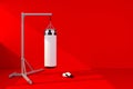 Punching bag with red wall