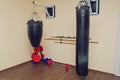 Punching bags in the gym.