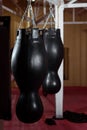 Punching boxing bag in the sport gym