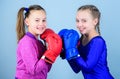 Punching knockout. Childhood activity. Fitness. energy health. Sport success. Friendship. Happy children sportsman in Royalty Free Stock Photo