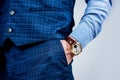 Punctuality is essential in the business world. Luxury watch worn on male wrist. Elegant timepiece. Observing Royalty Free Stock Photo