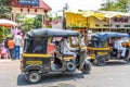Pune , India - April 26 2015 : Man drives tricycle in front of Saras Baug.