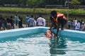 Pune, India - September 4, 2017: Pune Government servant doing ganpati visarjan in a water tank to save water pollution. Ganpati