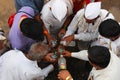 PUNE, MAHARASHTRA, INDIA, June 2016, Pilgrims or warkari filli up the water bottles, Pandharpur Palkhi Royalty Free Stock Photo