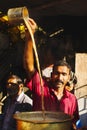 PUNE, MAHARASHTRA, January 2019, Tea vendor making chai for sale