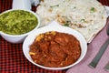 Punjabi chicken curry, hot soup, cheese naan Royalty Free Stock Photo