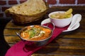 Punjabi cuisine paneer butter masala, clear veg soup, butter naan Royalty Free Stock Photo