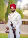 Punjabi Sikh groom in wedding attire.