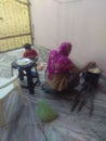 Punjabi women cooking on & x27;CHULLA& x27;