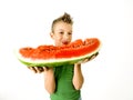Punk boy eating a big slice of watermelon Royalty Free Stock Photo