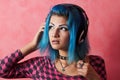 Punk girl DJ with dyed turqouise hair Royalty Free Stock Photo