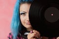 Punk girl DJ with dyed turqouise hair Royalty Free Stock Photo