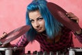 Punk girl DJ with dyed turqouise hair Royalty Free Stock Photo