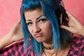 Punk girl DJ with dyed turqouise hair Royalty Free Stock Photo