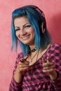 Punk girl DJ with dyed turqouise hair Royalty Free Stock Photo