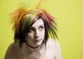 Punk Girl in front of a Green Wall Royalty Free Stock Photo