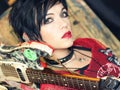 Punk girl with guitar Royalty Free Stock Photo