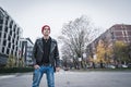 Punk guy posing in the city streets Royalty Free Stock Photo