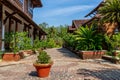Punnamada Resort, Alappuzha, Kerala, India - 19.01.2023: Beautiful tropical hotel with plants garden. Wooden roof